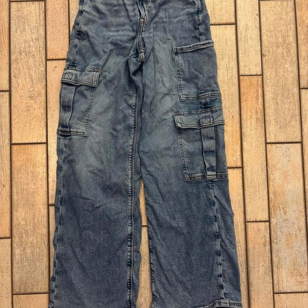 American Eagle Outfitters blue denim cargo jeans with a relaxed fit
